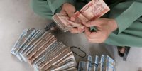تهاتر ریال و افغانی رسمی میشود / جزئیات برنامه ایران در تجارت با افغانستان تهاتر ریال و افغانی رسمی میشود / جزئیات برنامه ایران در تجارت با افغانستان
